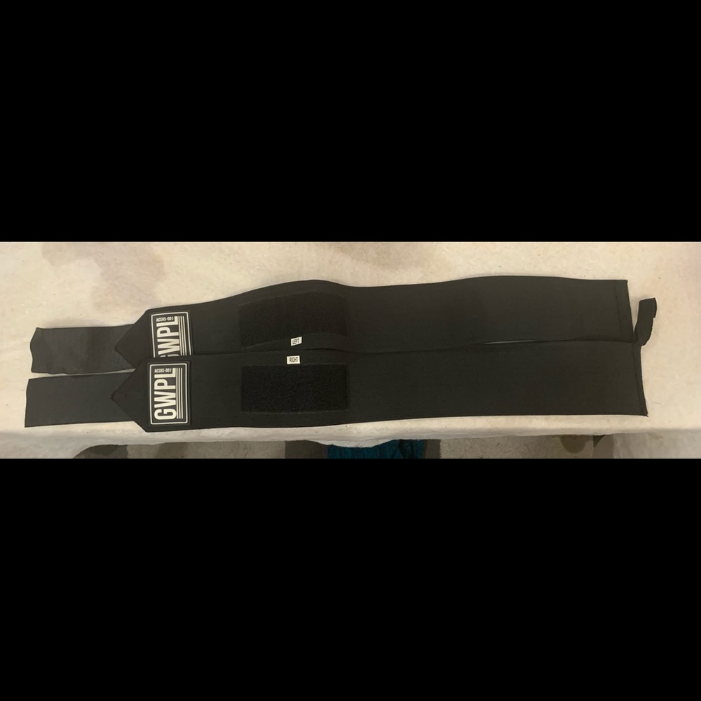 Girls who powerlift wrist wraps